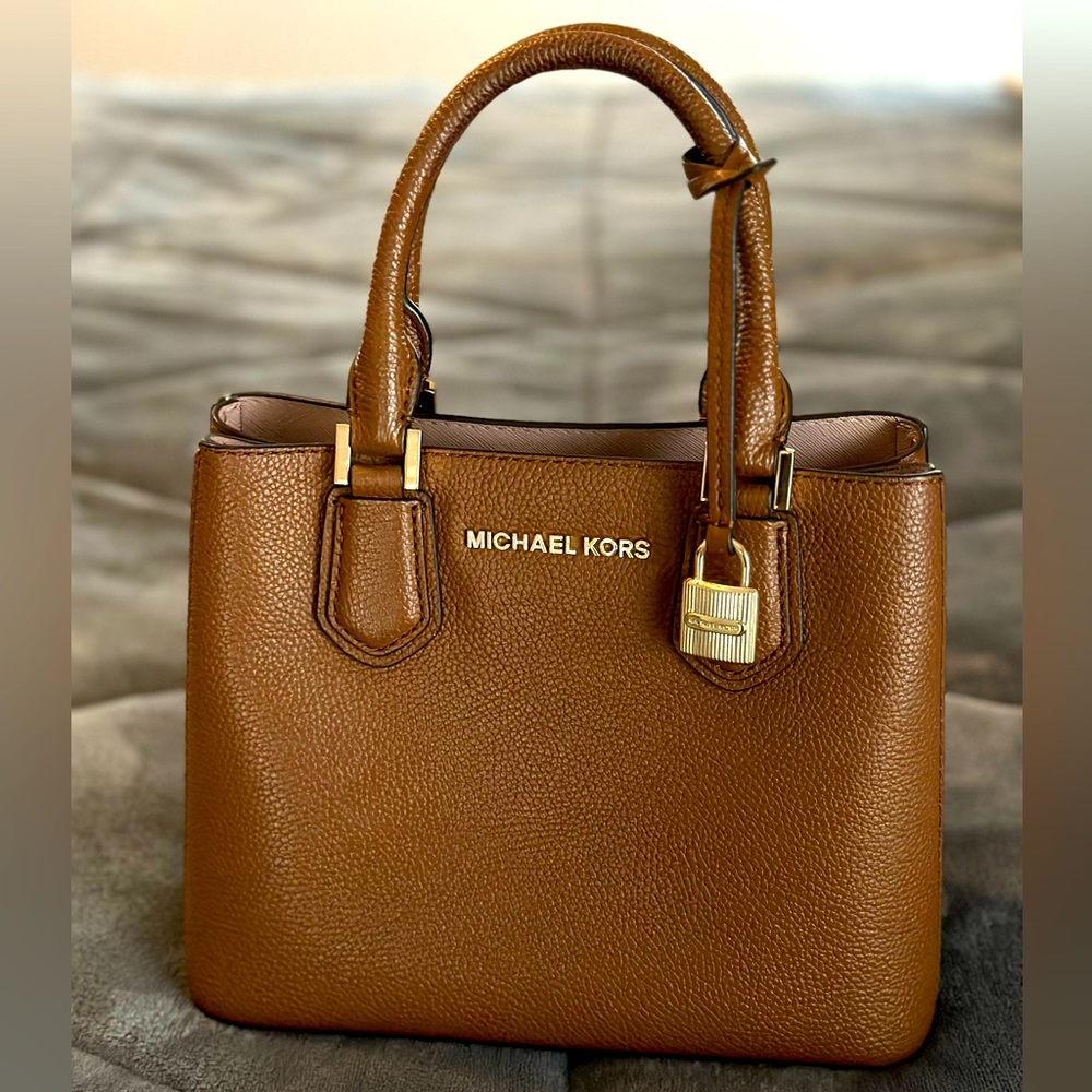 Authentic Michael Kors satchel purse. Tan midsize bag with gold hardware.